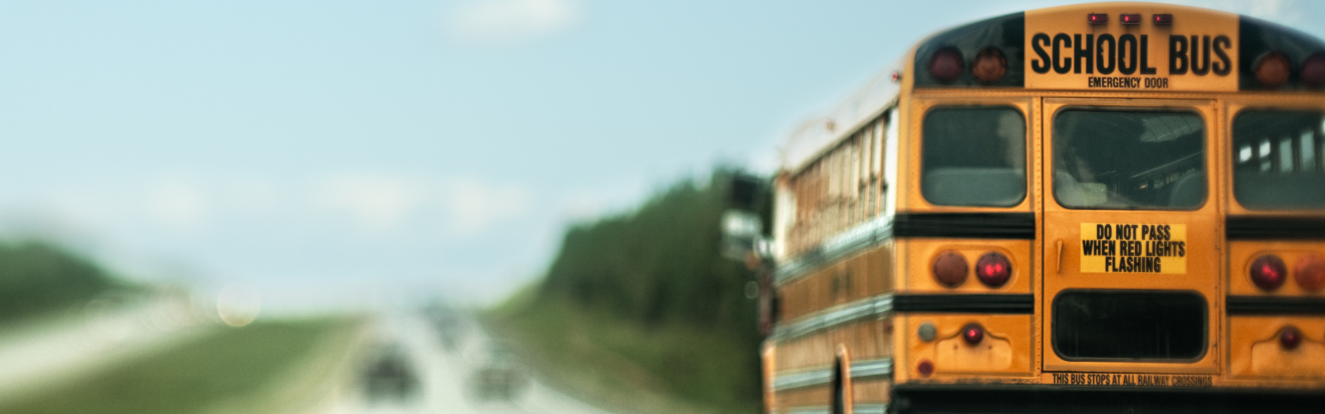 school bus driving on road