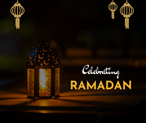 A light filled lantern against a dark background. 