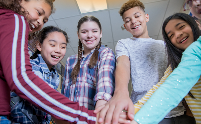 Students bumping hands