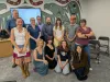 Students and members of the Board of Education pose for a photograph in the Board Room. 